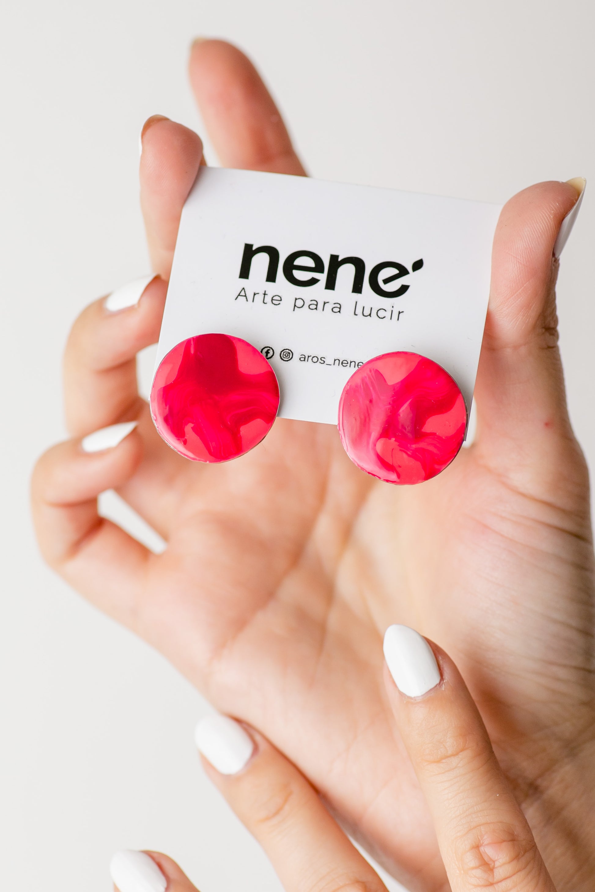 Nené círculo fucsia