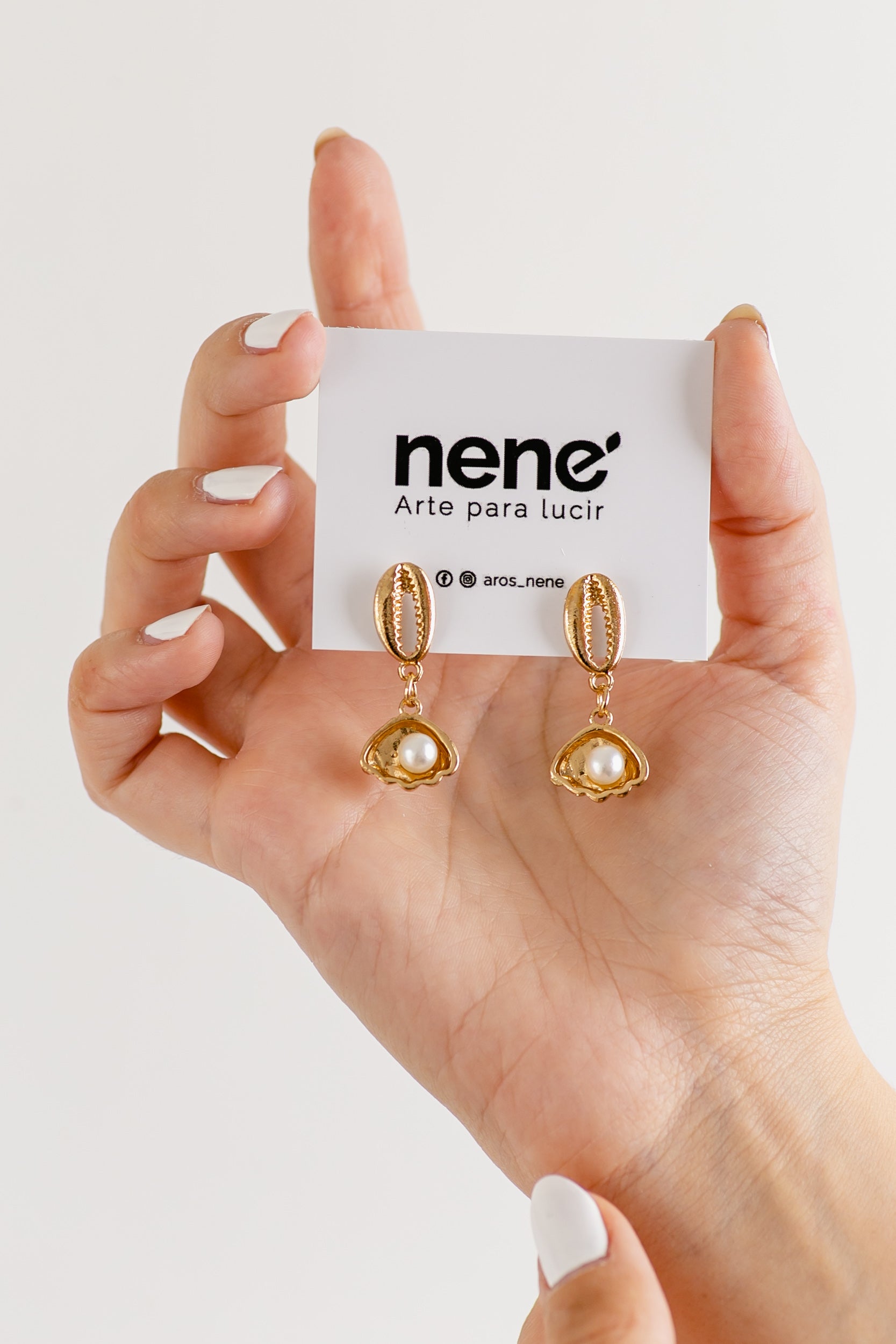 Nené dorado con perla