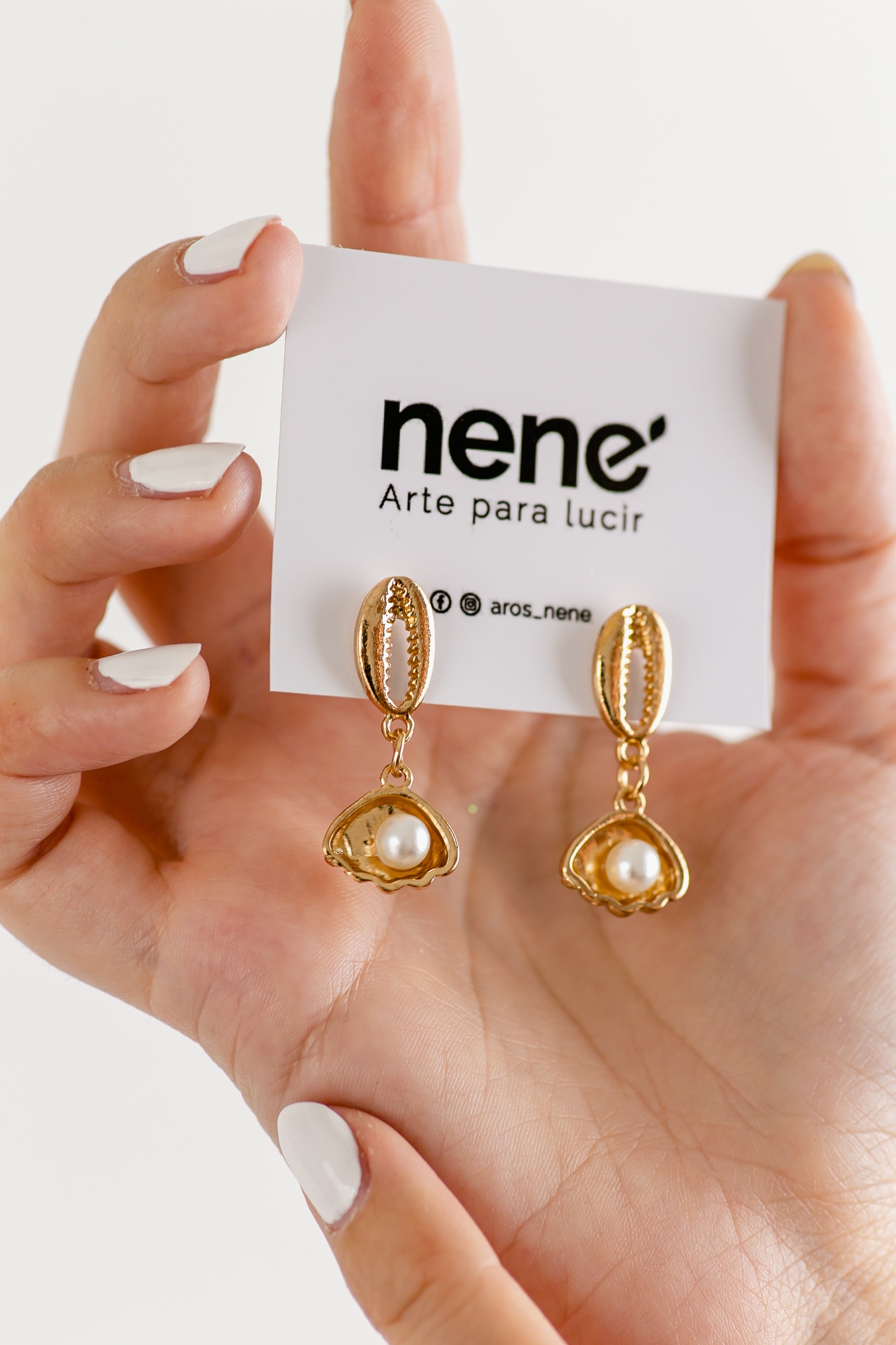 Nené dorado con perla